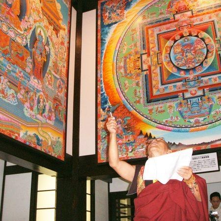 lama shashi dhoj tulachan with his paintings
