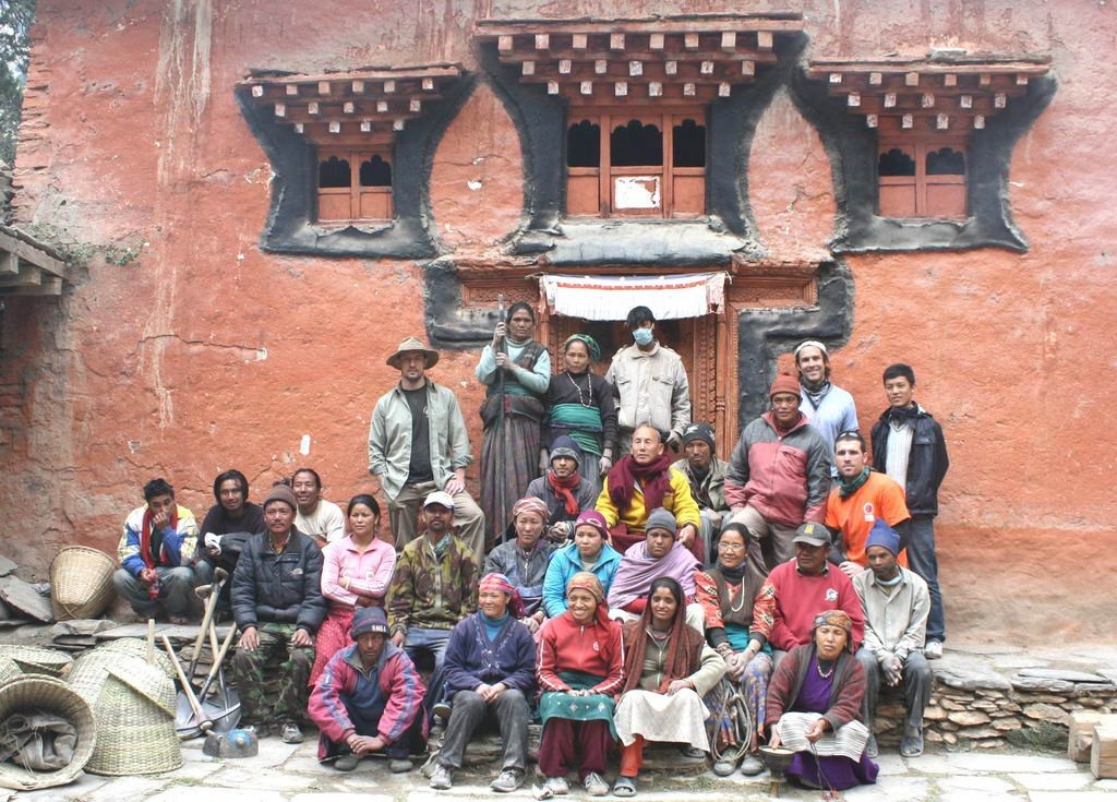 Lama Shashi with community members and international volunteers at Chhairo gompa.

