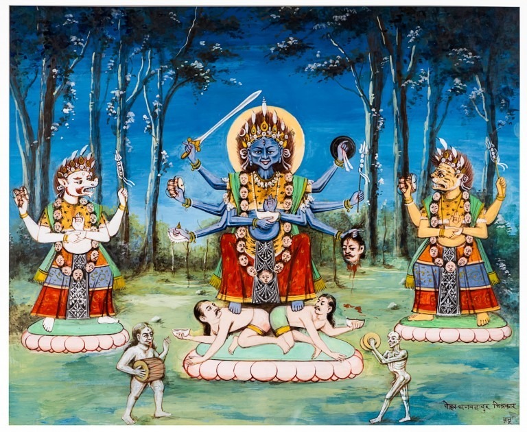 Bhadrakali flanked by Shingni, the white lion, to her right; Bhangini, the yellow tiger, to her left. At her feet, a demon and a skeleton play the nyakhin and chusya, traditional Newar ritual instruments. 