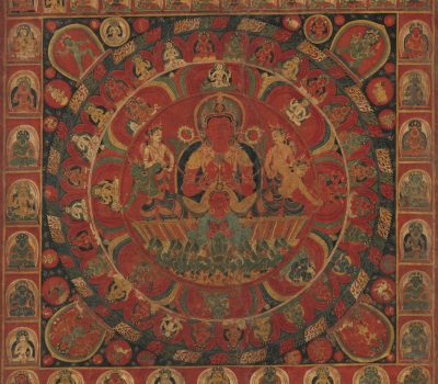 Mandala of solar deity Surya, riding in his solar chariot drawn by seven horses. Surys is flanked by two goddesses shooting arrows to drive away the darkness. The eight planetary deities encircle Surya’s mandala.