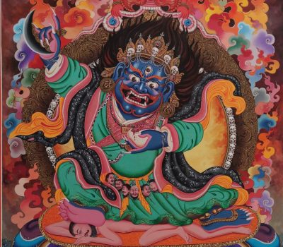 Mahakala Bernagchen in a fierce form holding a curved flaying knife (kartika) with a vajra handle on his right and lood-filled skull cup (kapala) on his left.